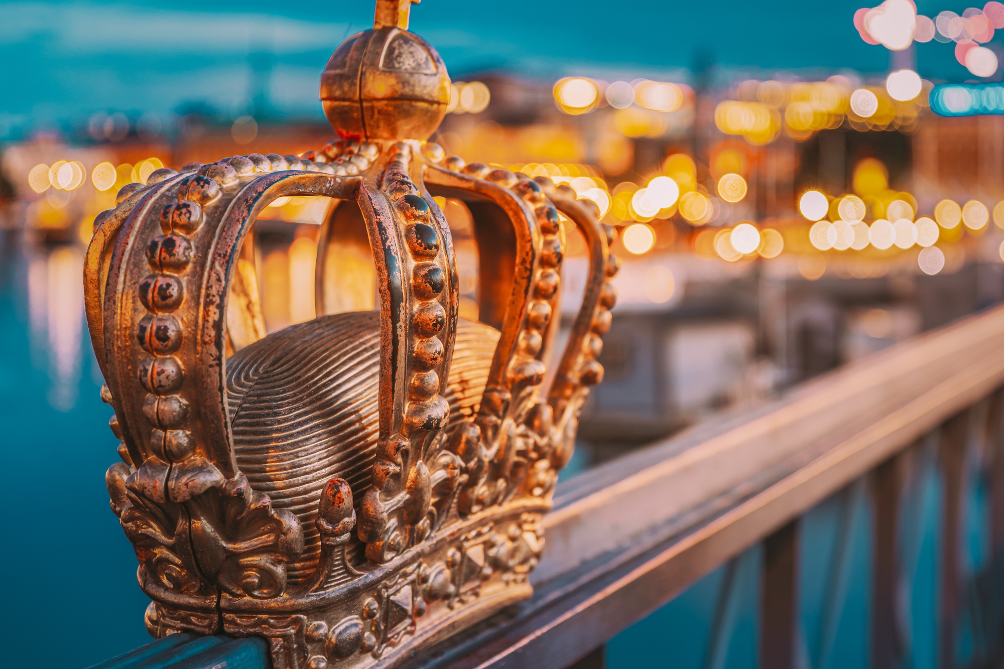 Stockholm, Sweden. Skeppsholmsbron - Skeppsholm Bridge With Its Famous Golden Crown In Night Lights